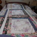 2016 The needlepoint squares were a gift and I made a king size quilt