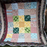 My grandmother did the center squares and I made this for my mom